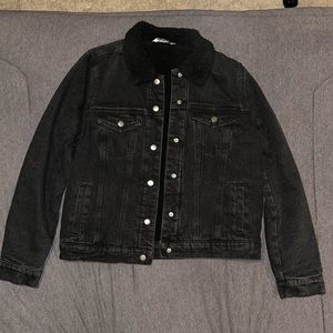 A medium fur-lined black denim jacket from Highway Jeans.